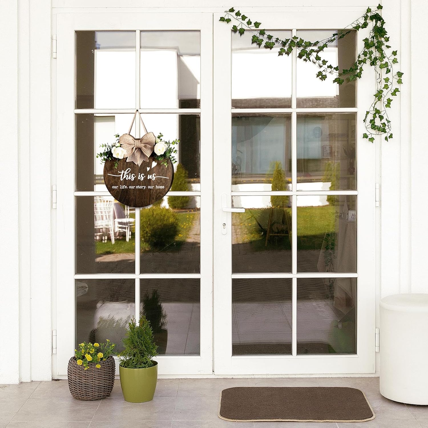 This is Us Welcome Sign Rustic Round Wood Door Decor with Ribbon Bow and Artificial Greenery