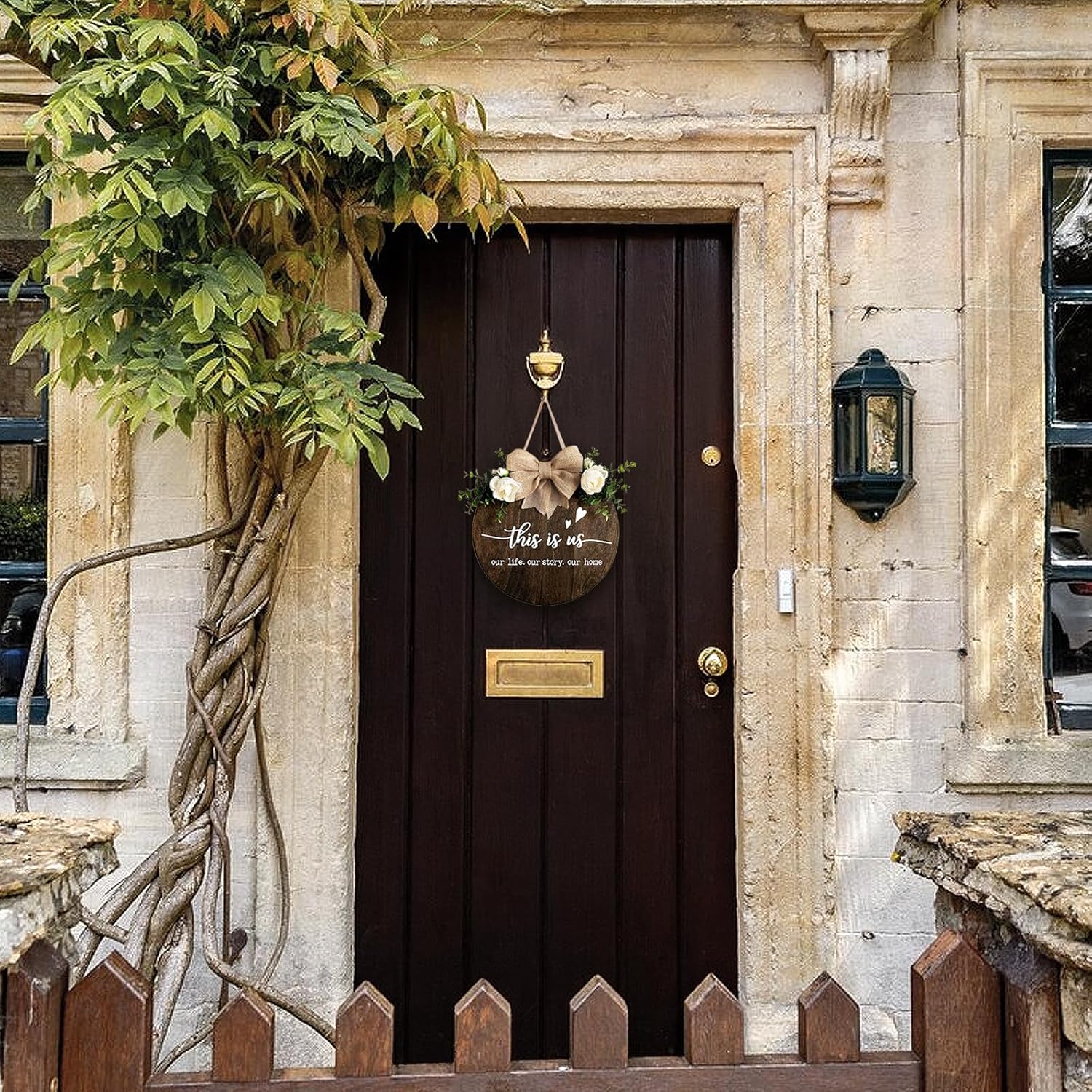 This is Us Welcome Sign Rustic Round Wood Door Decor with Ribbon Bow and Artificial Greenery